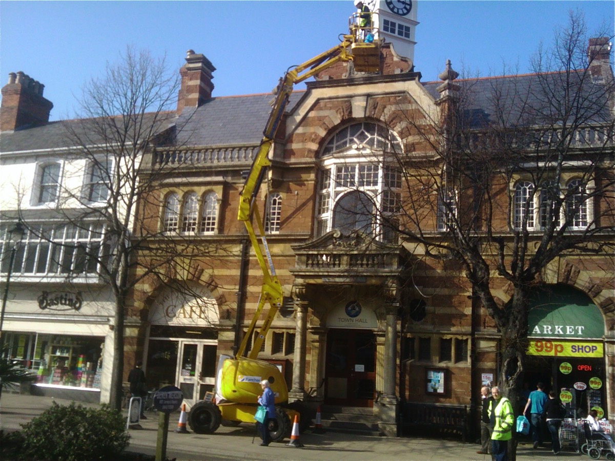 Installing pigeon proofing at the town hall in Minehead, Somerset. 